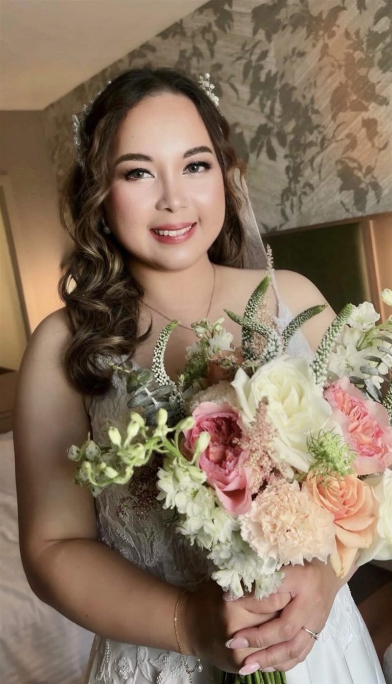 Zha Vallejo wearing her bridal makeup and hairstyle by Thedz Makeup Chair